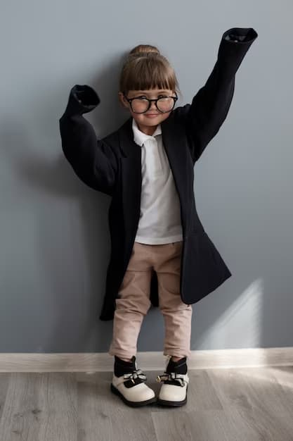 Photo d'une filette avec un manteau trop grand pour elle